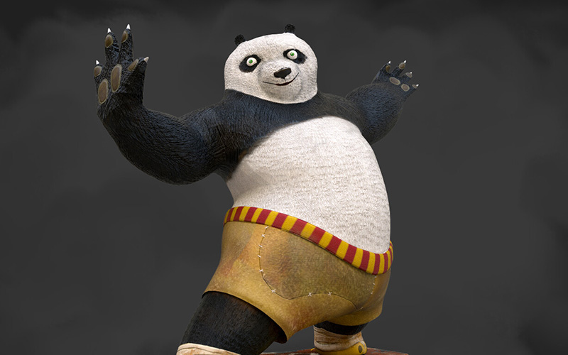 A panda bear standing on a rock with arms outstretched, showcasing its playful and adorable nature.