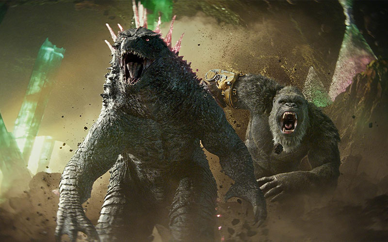 A powerful monster with spikes on its back, Godzilla stands tall amidst a city in ruins.