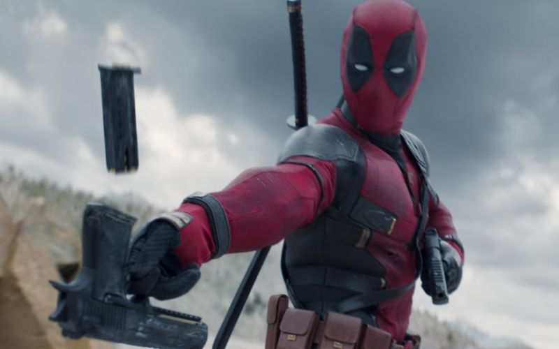 Deadpool 3 featuring the iconic masked anti-hero holding two katanas.